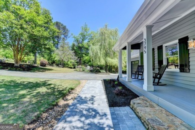 Your private lakeside retreat awaits. Set on spacious acreage in - photo 5