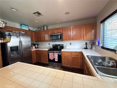 Welcome to 25323 Bayside, a two-level townhome nestled in the - photo 8