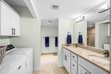 Exceptional golf course views wrap around this renovated - photo 21
