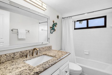 Exceptional golf course views wrap around this renovated - photo 24