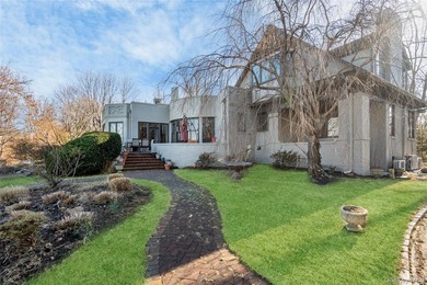 Located on a high bluff overlooking the Long Island Sound, this - photo 1