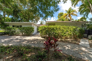 Located on one of Bay Heights' most sought-after streets, this - photo 3