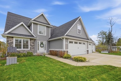 Experience luxury lakefront living on beautiful Houghton Lake in - photo 4