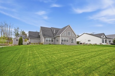 Experience luxury lakefront living on beautiful Houghton Lake in - photo 5