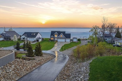 Experience luxury lakefront living on beautiful Houghton Lake in - photo 6