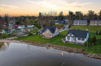Experience luxury lakefront living on beautiful Houghton Lake in - photo 8