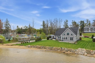Experience luxury lakefront living on beautiful Houghton Lake in - photo 10