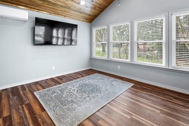 Welcome to your retreat in Holly Lake Ranch, a premier gated