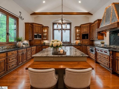 Beneath a vaulted ceiling lined with exposed wood beams and - photo 12