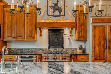 Beneath a vaulted ceiling lined with exposed wood beams and - photo 13