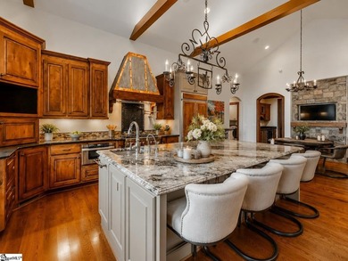 Beneath a vaulted ceiling lined with exposed wood beams and - photo 14