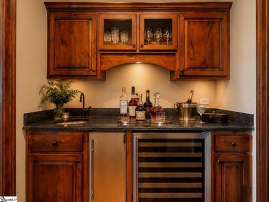 Beneath a vaulted ceiling lined with exposed wood beams and - photo 18
