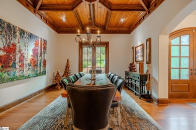 Beneath a vaulted ceiling lined with exposed wood beams and - photo 20