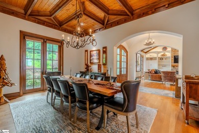Beneath a vaulted ceiling lined with exposed wood beams and - photo 21