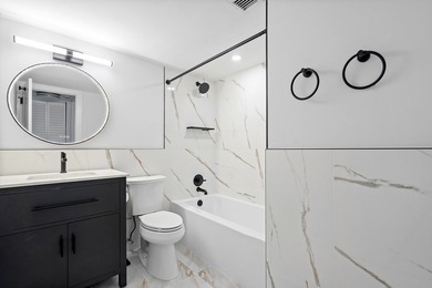 Welcome to Unit 109 at Boca House - a stunning, fully renovated - photo 21