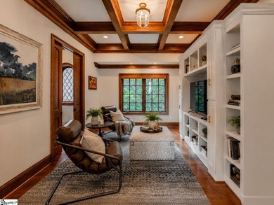 Beneath a vaulted ceiling lined with exposed wood beams and - photo 23