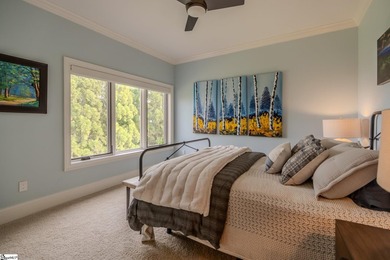 Beneath a vaulted ceiling lined with exposed wood beams and - photo 32