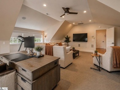 Beneath a vaulted ceiling lined with exposed wood beams and - photo 40