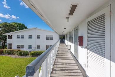 Welcome to this well-maintained second-floor condo in the - photo 3