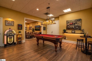 Beneath a vaulted ceiling lined with exposed wood beams and - photo 46