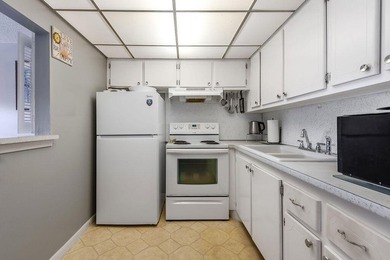 Welcome to this well-maintained second-floor condo in the - photo 8