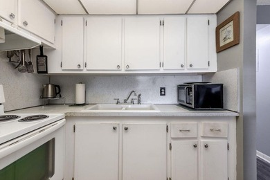 Welcome to this well-maintained second-floor condo in the - photo 9
