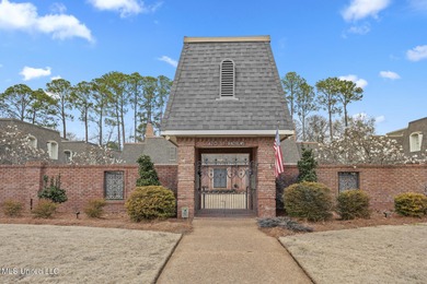 Located in the highly sought-after Country Club of Jackson