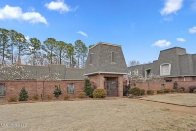 Located in the highly sought-after Country Club of Jackson