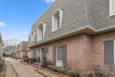 Located in the highly sought-after Country Club of Jackson