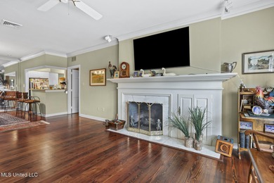 Located in the highly sought-after Country Club of Jackson