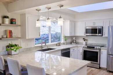 Beautifully updated custom home with breathtaking valley and - photo 7