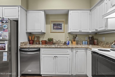 Located in the highly sought-after Country Club of Jackson