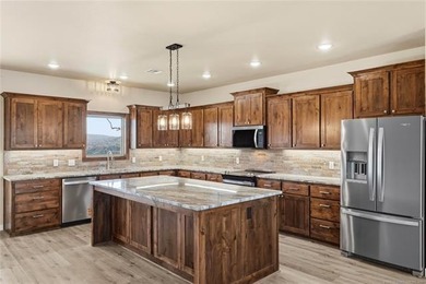 Now includes 5 bedrooms AND a 30X50 finished garage/shop! - photo 25