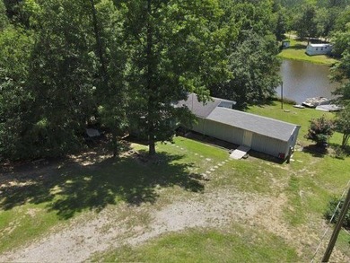 Cheap & Cheerful! This lakefront SW comes furnished with Five - photo 1