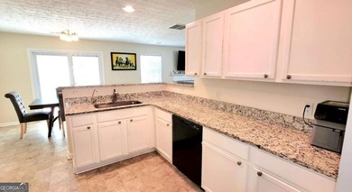 Welcome home to a charming two-story residence nestled in the - photo 7