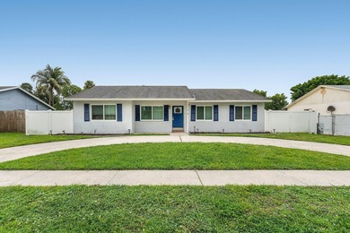 Welcome to this charming single-story residence located in - photo 1