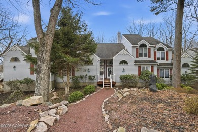 Fully remodeled in 2023, this Lake Harmony home offers modern - photo 1