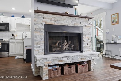 Fully remodeled in 2023, this Lake Harmony home offers modern - photo 3