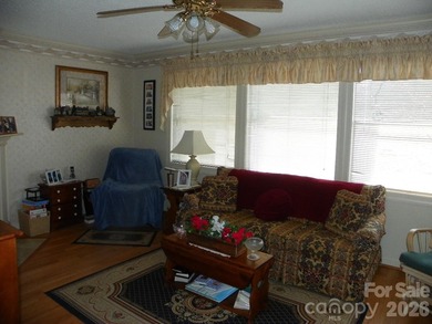 Must see this adorable Park model with full room addition - photo 7