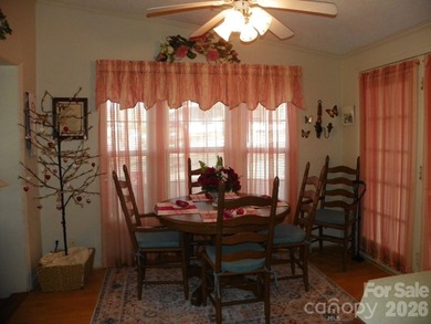 Must see this adorable Park model with full room addition - photo 9
