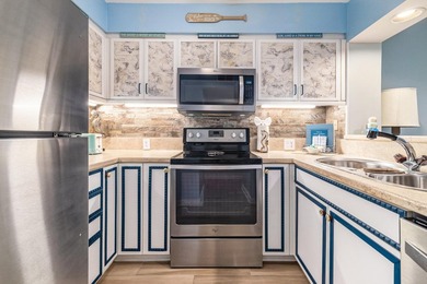 Welcome to this beautifully updated top-floor end-unit 1-bedroom - photo 13
