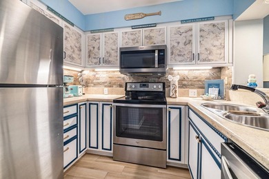 Welcome to this beautifully updated top-floor end-unit 1-bedroom - photo 14