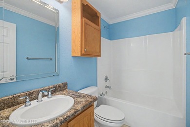 Welcome to Beau Clair Condominium, where coastal elegance meets - photo 19