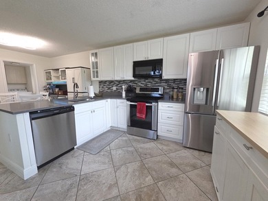 One of Palm City's Sunset Trace community gem's! Recent updates - photo 1