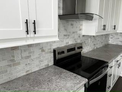 This under-construction home features a spacious and modern - photo 3