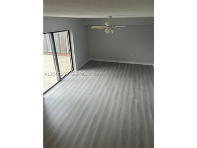 Renovated 2 bed 2 bath TH, LVT flooring downstairs, carpet - photo 5