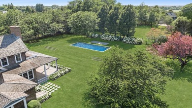 Down a long gated driveway on a secluded and beautifully - photo 4
