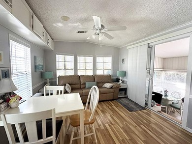 This charming 1.0 bed 1.0 bath Park Model home is located within - photo 2