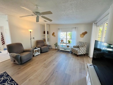 This meticulously maintained two-bedroom, two-bath home is - photo 13