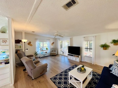 This meticulously maintained two-bedroom, two-bath home is - photo 14
